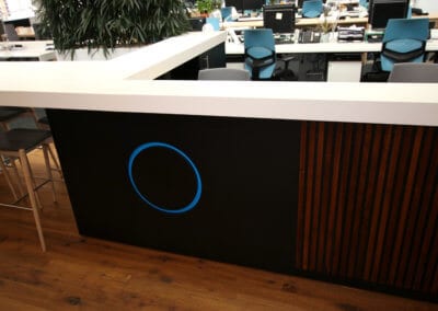 Bespoke office reception desk with Corian solid surface