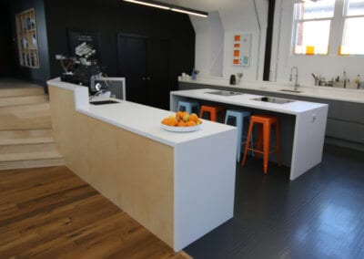 Kitchen work area completely cladded with solid surface Corian� worktops