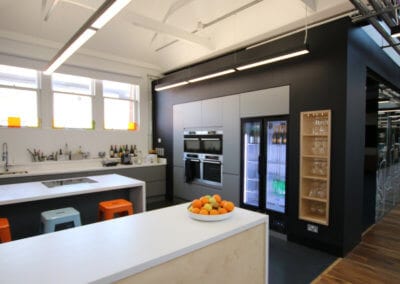 Kitchen work area completely cladded with solid surface Corian� worktops by Allstar Joinery